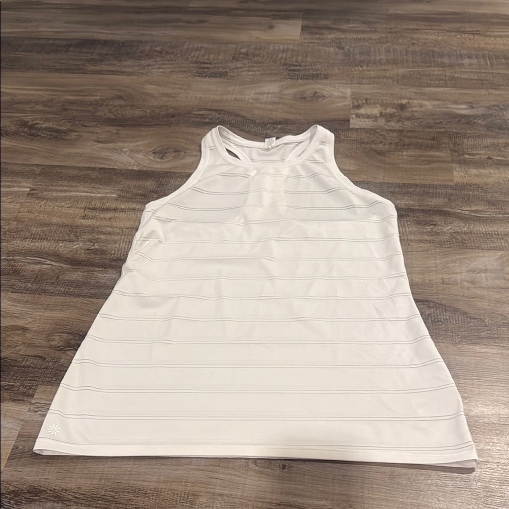 Lightly worn Athleta White Racerback Tank Top with A-Line Hem size S